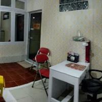 Praktek Dokter Dr. Dewi Agustina, M.M.R. ico